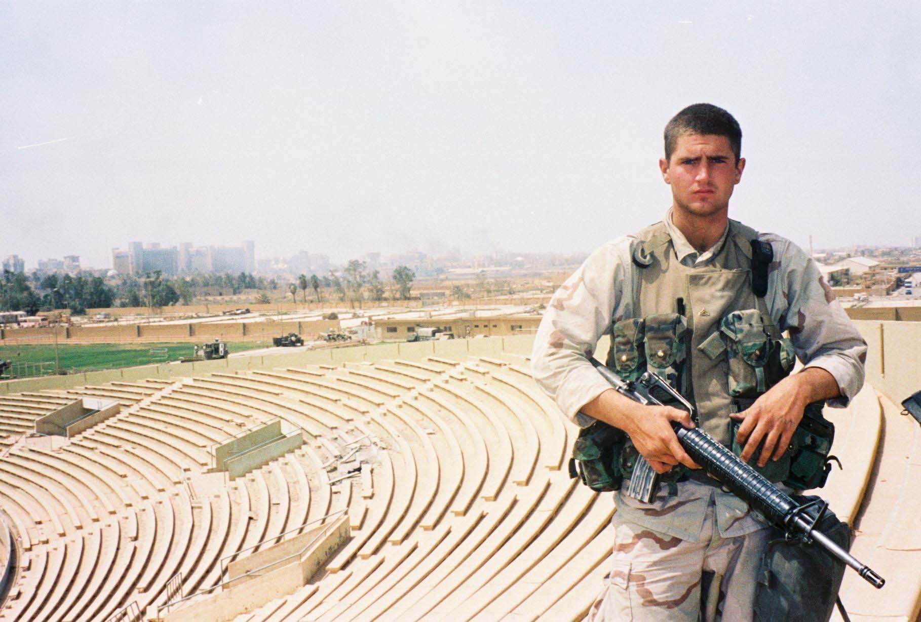 Tyson Manker in Marine Corps uniform at the Al-Shaab amphitheater in Baghdad, Iraq, 2003