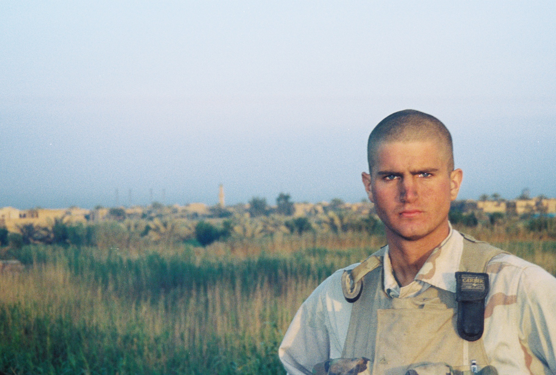 Tyson Manker in Marine Corps uniform on the outskirts of Karbala, Iraq, 2003